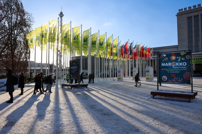 The Messe Nord entrance in winter with many flags.